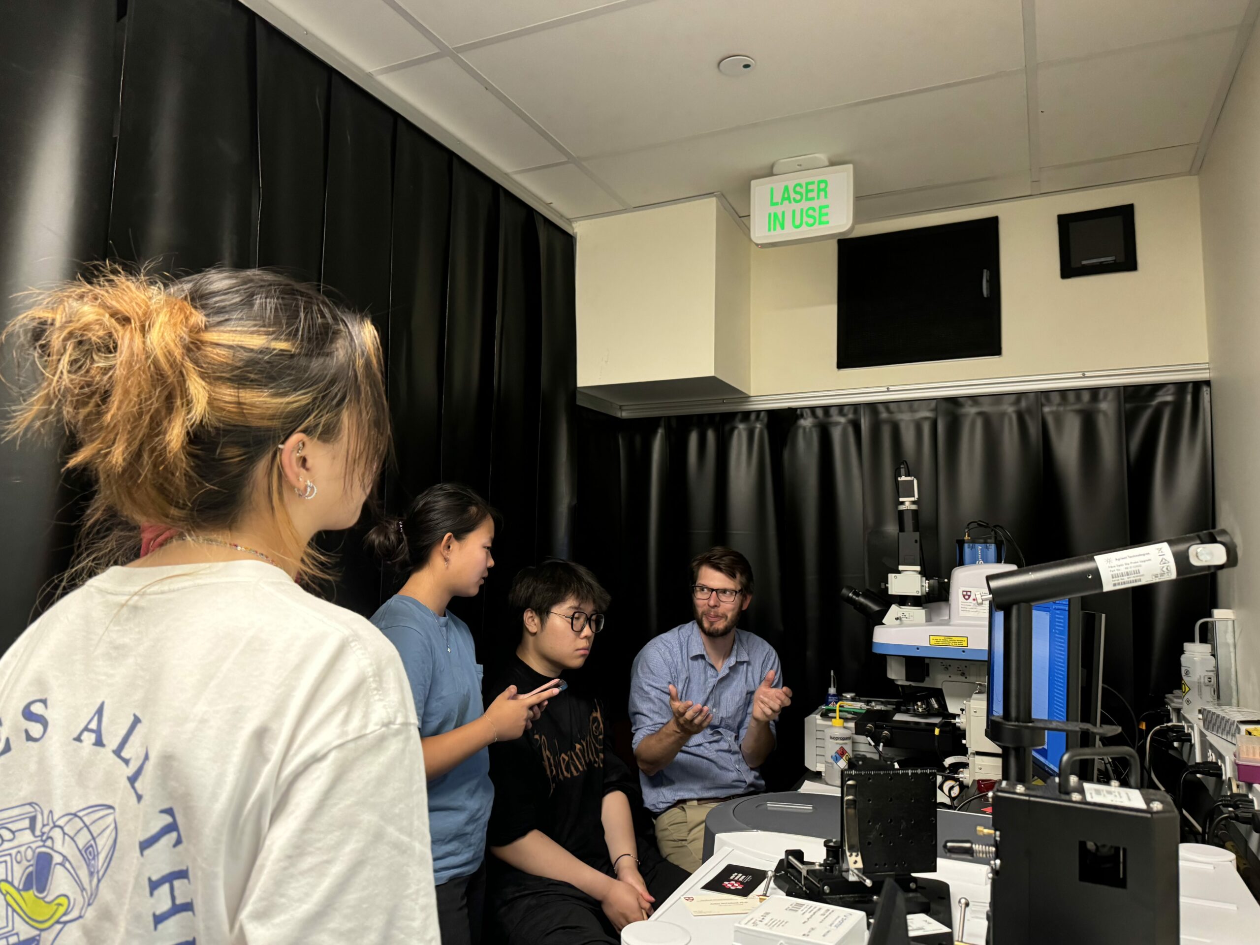 Dr. Arthur McClelland teaches students how to use the Raman Spectrometer